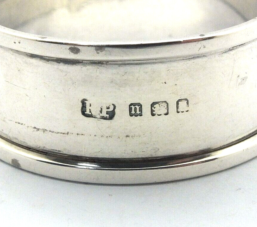 Solid silver near antique napkin ring