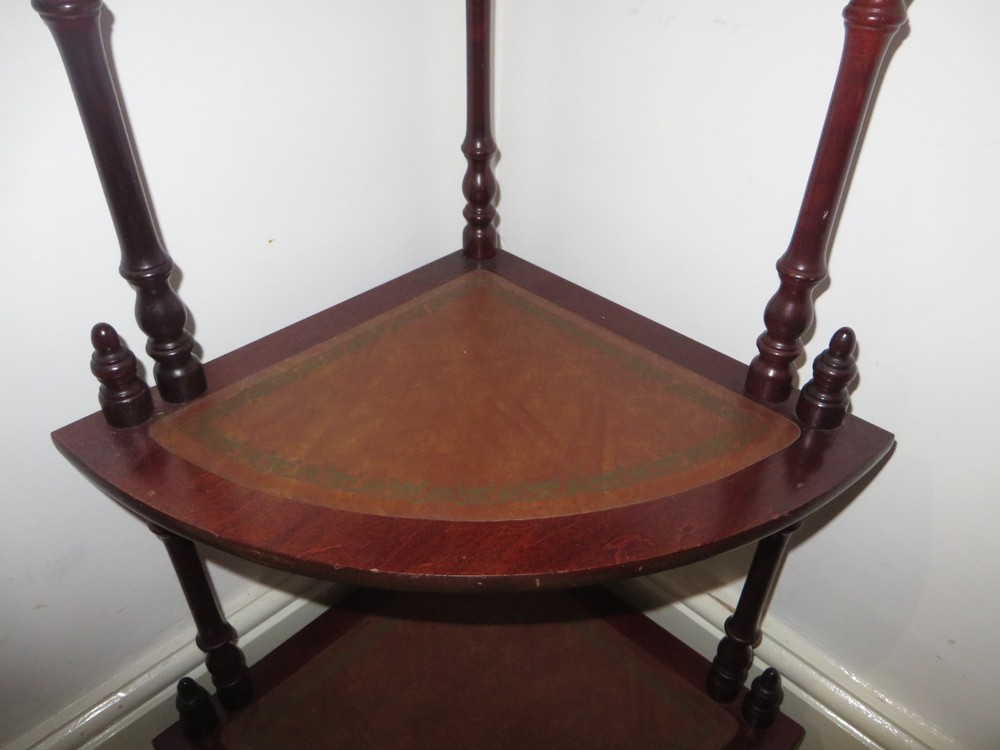ANTIQUE CORNER UNIT WITH LEATHER SHELFS