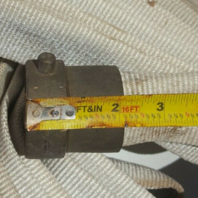 F-M Fireman Hose Rack with Fire Hose.