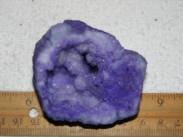 Geode cut & polished half with colored crystal center 2.5 inch E25