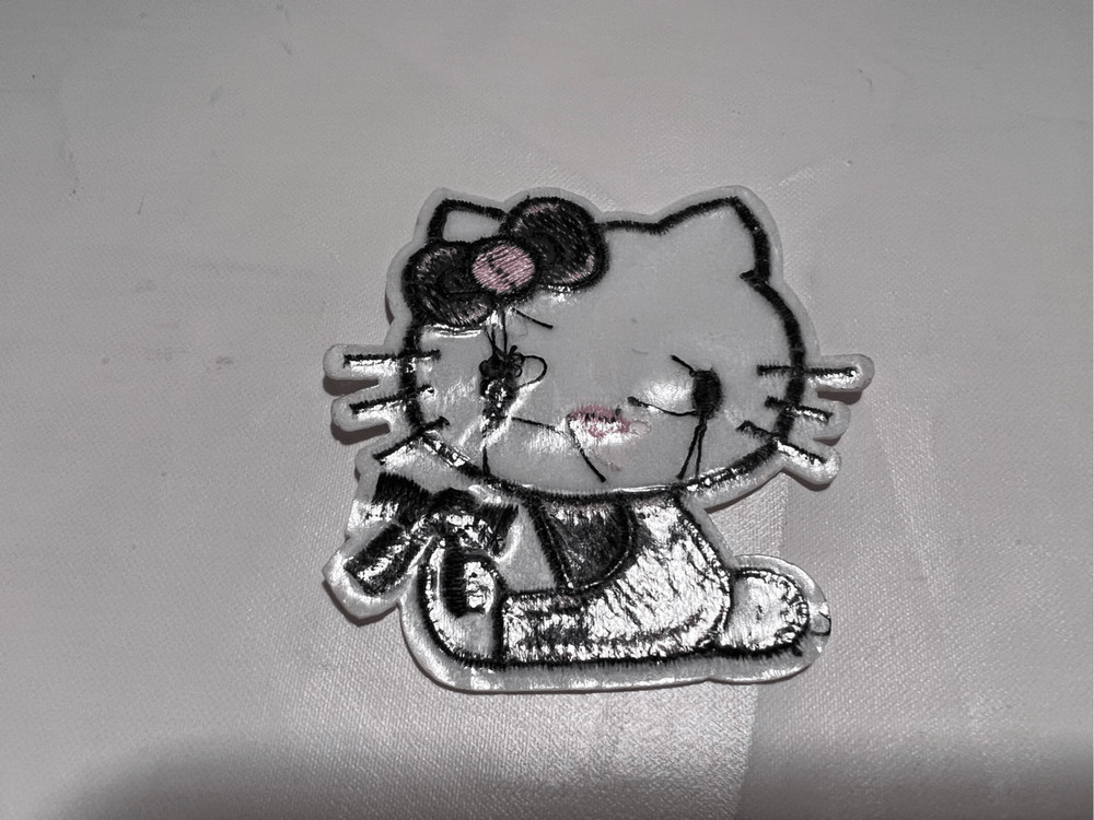 Hello Kitty with a Black Bow Iron on Patch