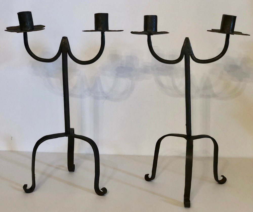 ANTIQUE EARLY WROUGHT IRON CANDLE HOLDERS.