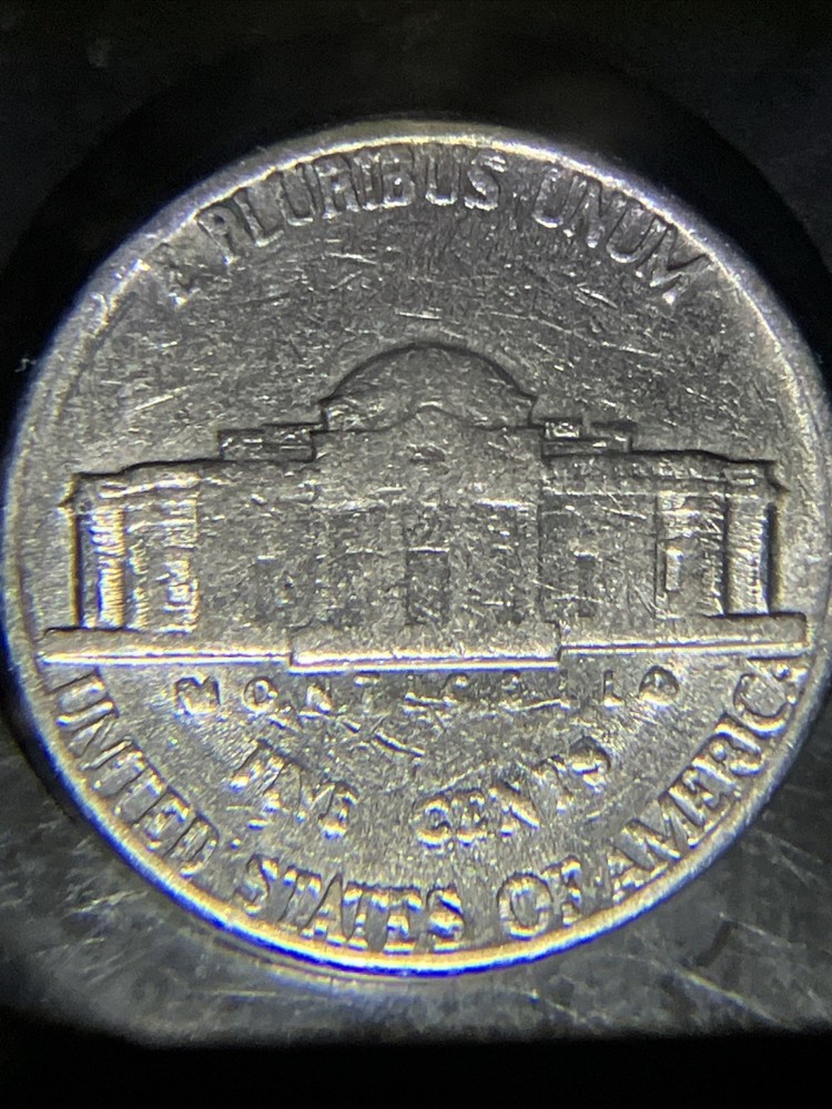 1980 D Nickle Struck Through Grease