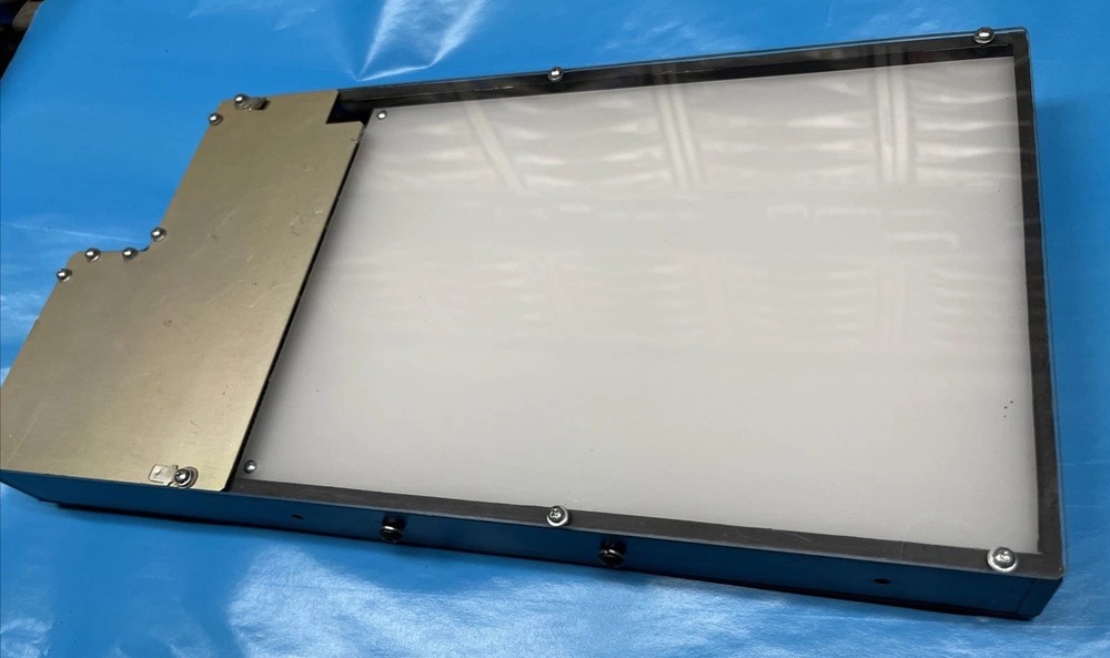 Electronic Chips Inside Testing Light Box For Perhaps Plastic Bottles Integrity.