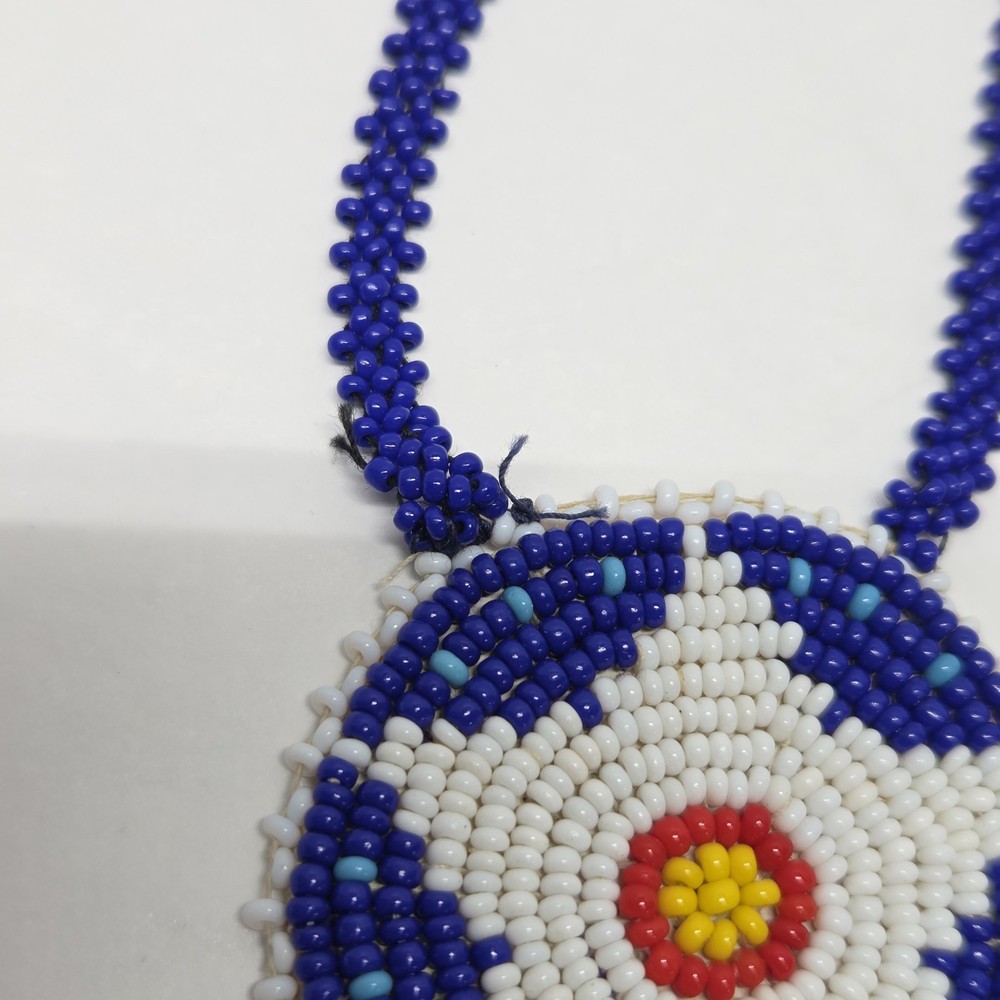 Handmade seed beaded Star pendant necklace.