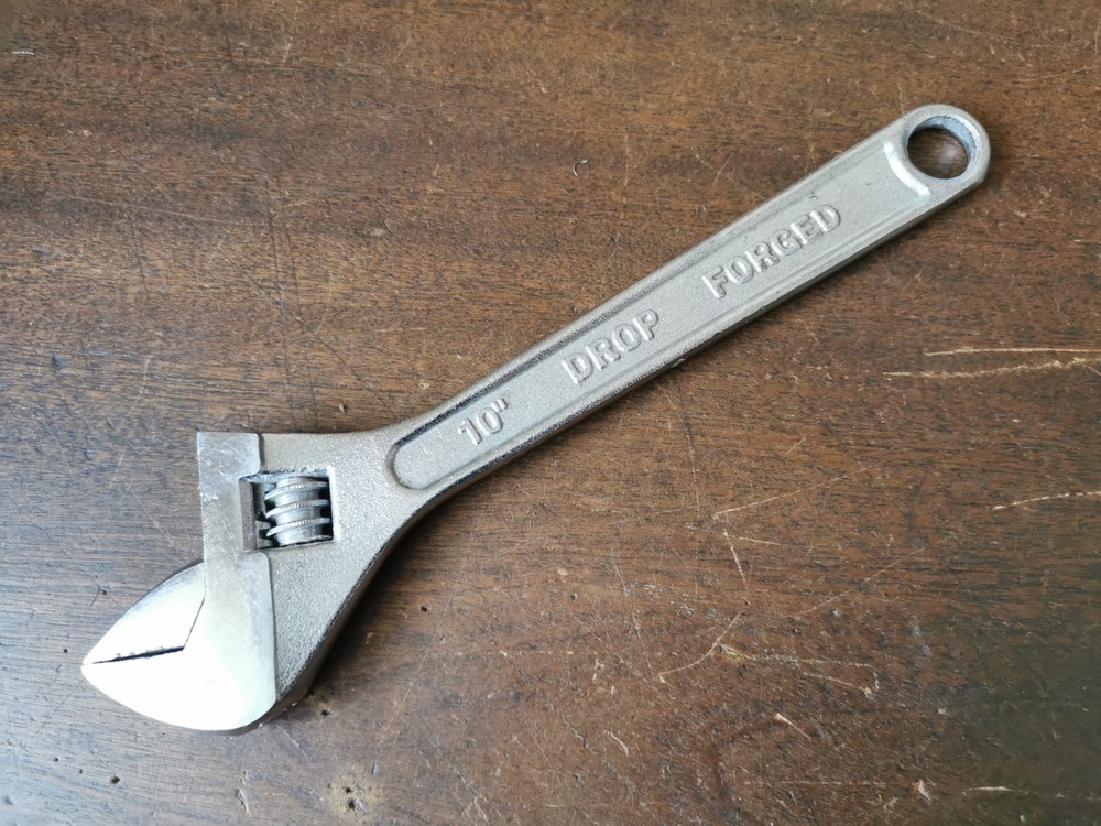 Modern 10" Adjustable Spanner to clear, no makers name.