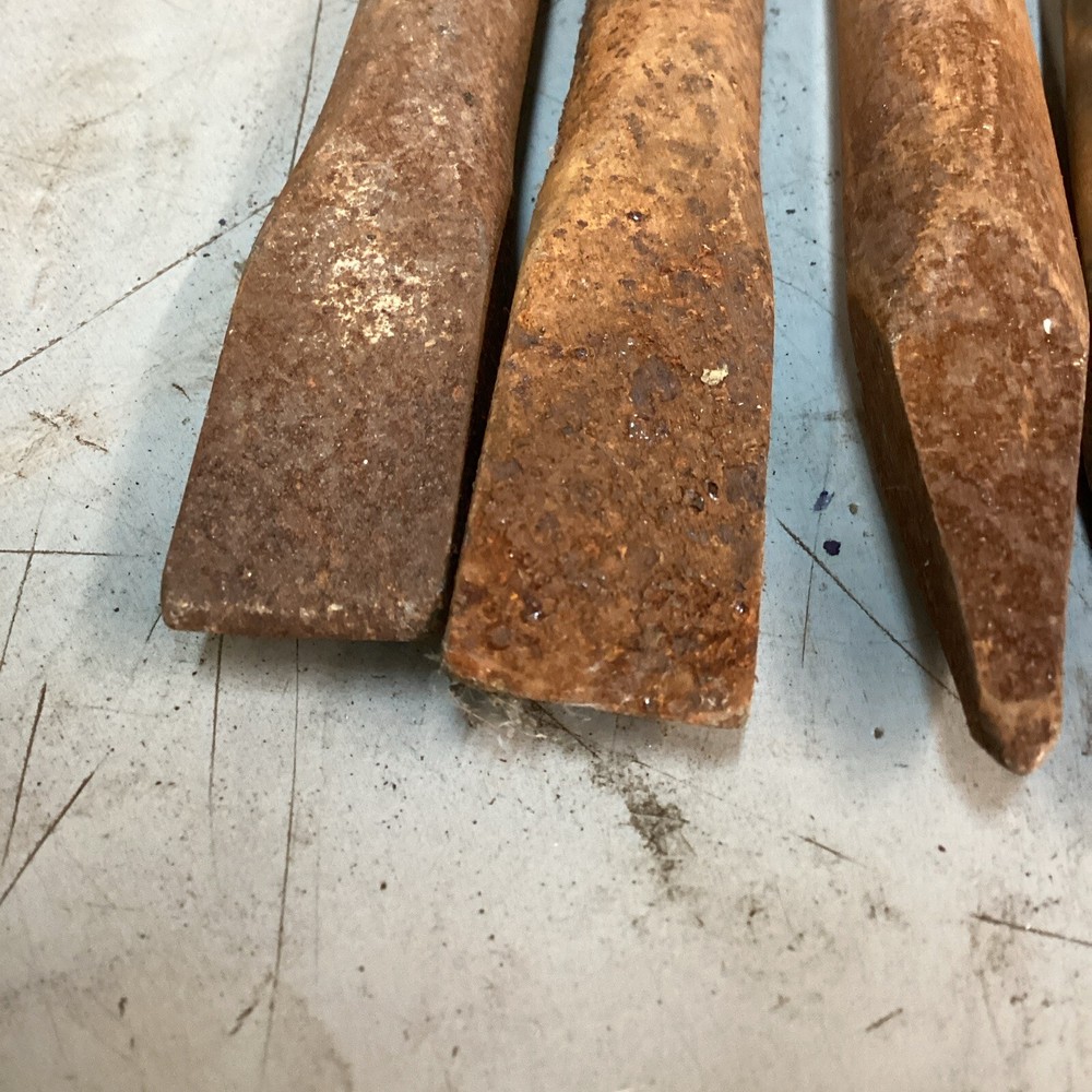 Four 8-1/2” Hammer Bits 2 Moil Point And 2 Flat Chisel