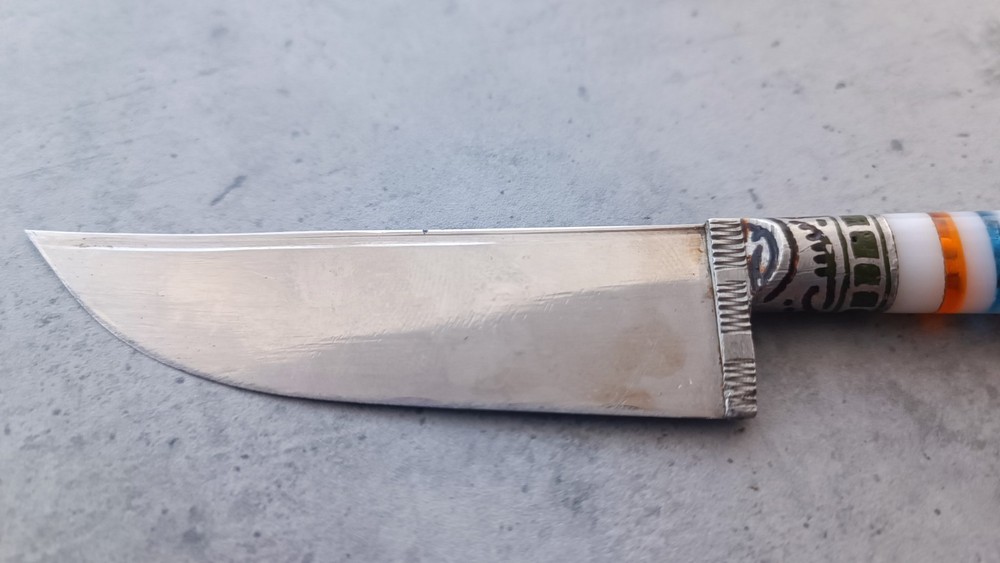 Vintage handmade knife with pattern.