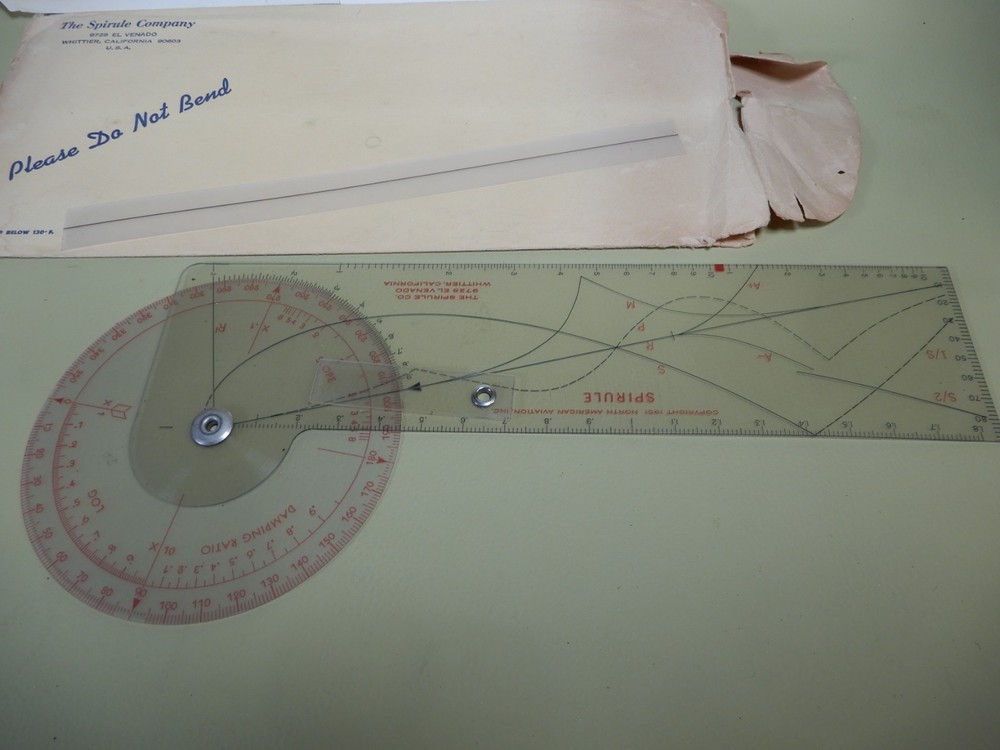 Spirule Company Calculator Great Condition with Documentation and Worn Envelope
