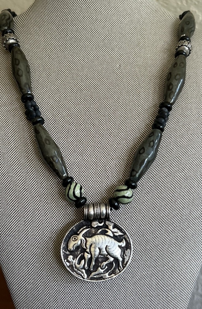 hand crafted beaded necklace Whit Carved Pendant