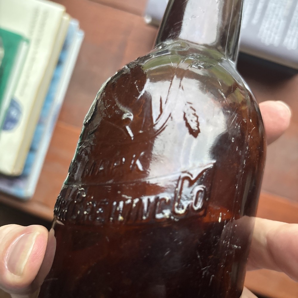 Schmulbach Brewing Co Embossed Amber Beer Bottle; Wheeling WVA