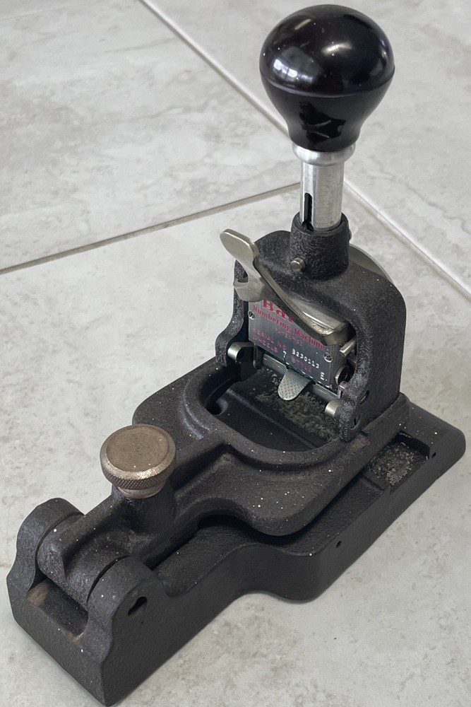 VNTG BATES NUMBERING MACHINE STANDARD MOVEMENT 7 WHEELS STYLE E W/CAST IRON BASE