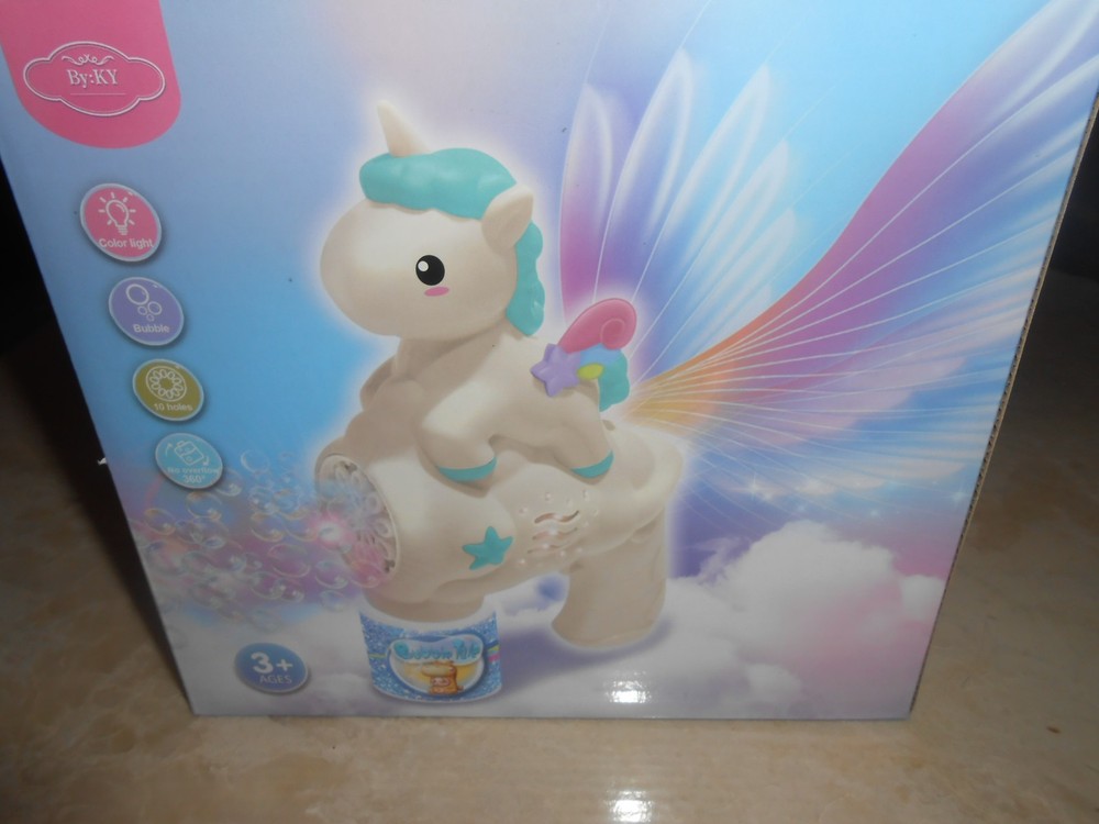 Blue Unicorn Bubble Gun Blower in box.