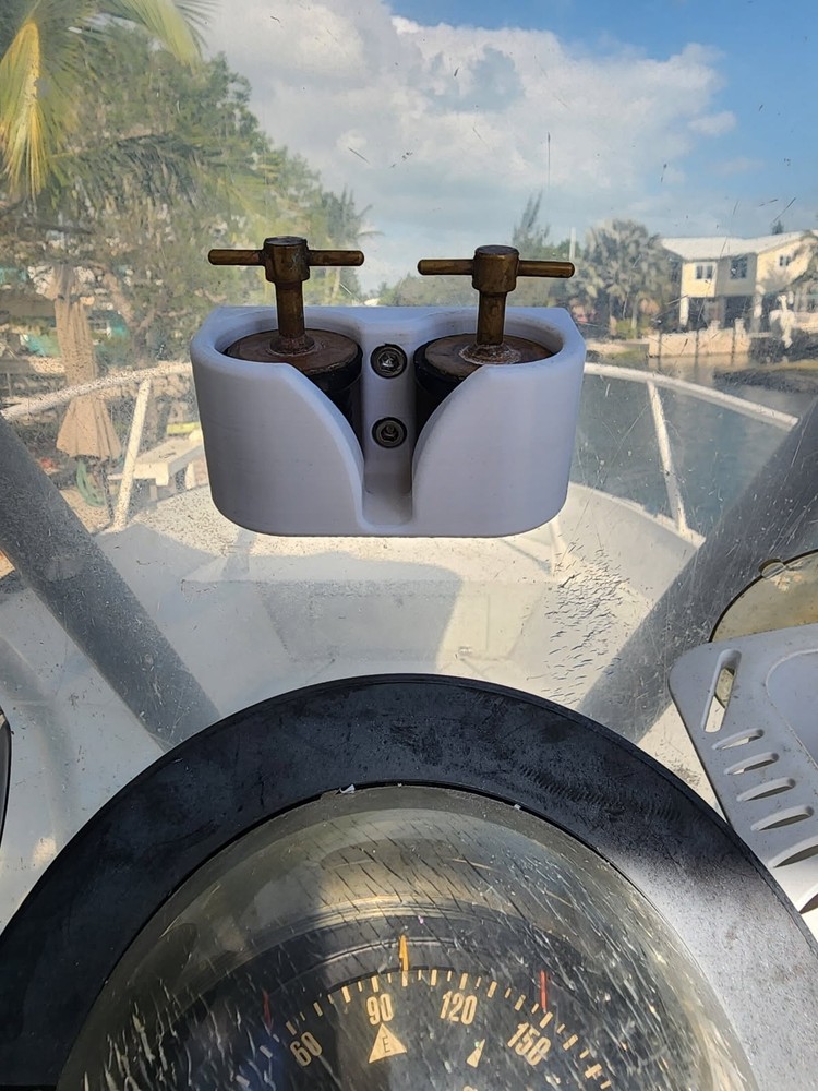 Scupper plug holder