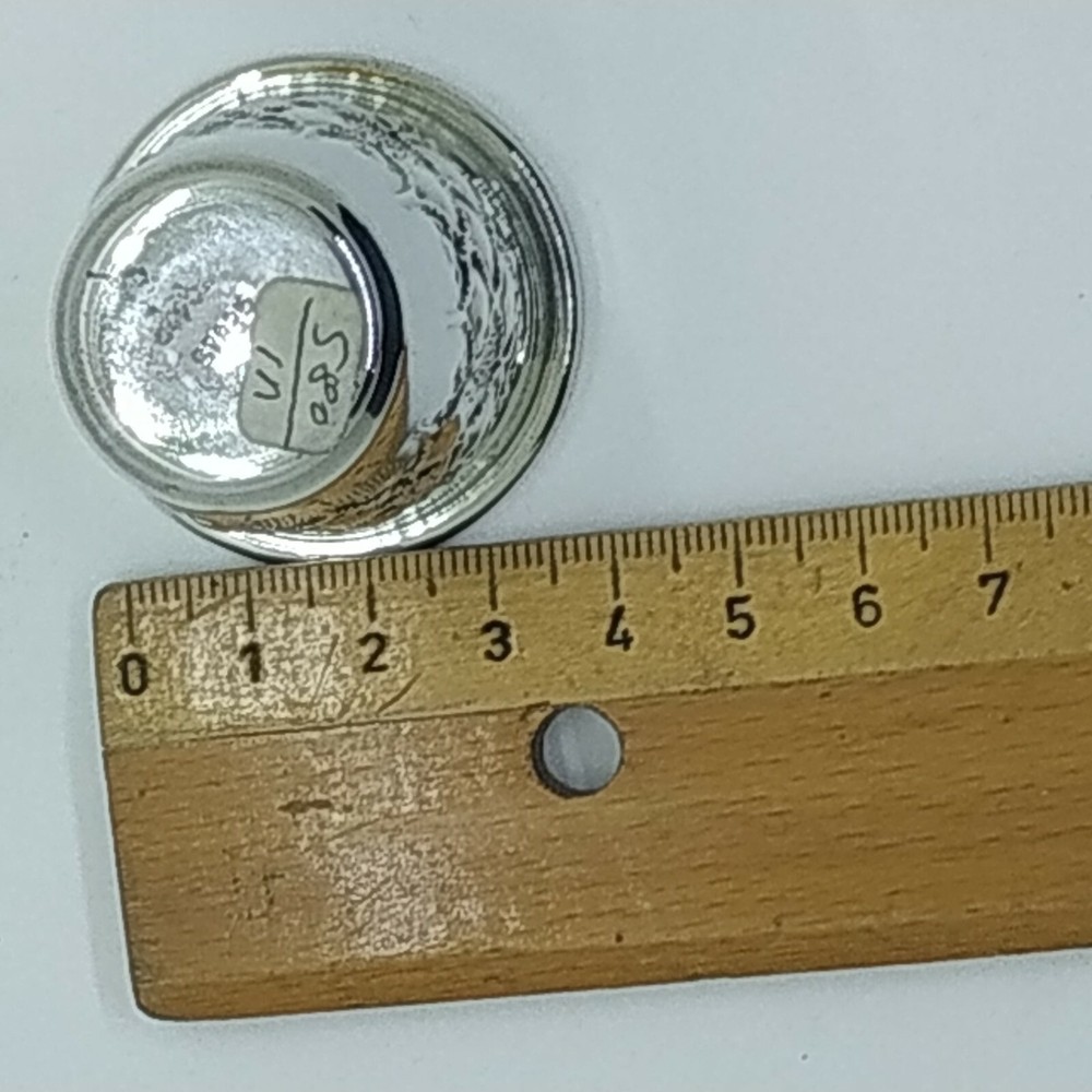 Handmade sterling silver liquor cup with embossed design