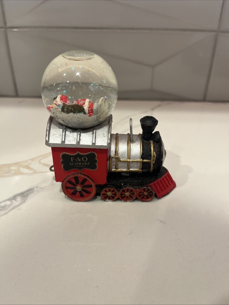 F.A.O SCHWARZ 4- piece Train Snow Globe Set