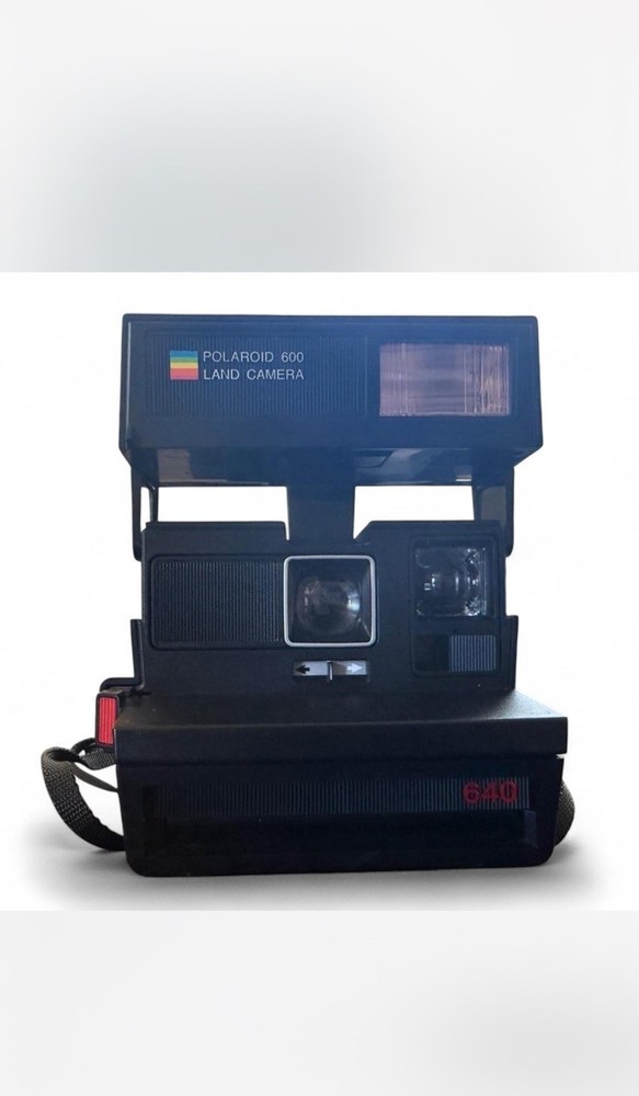 Vintage Polaroid 600 black camera with strap