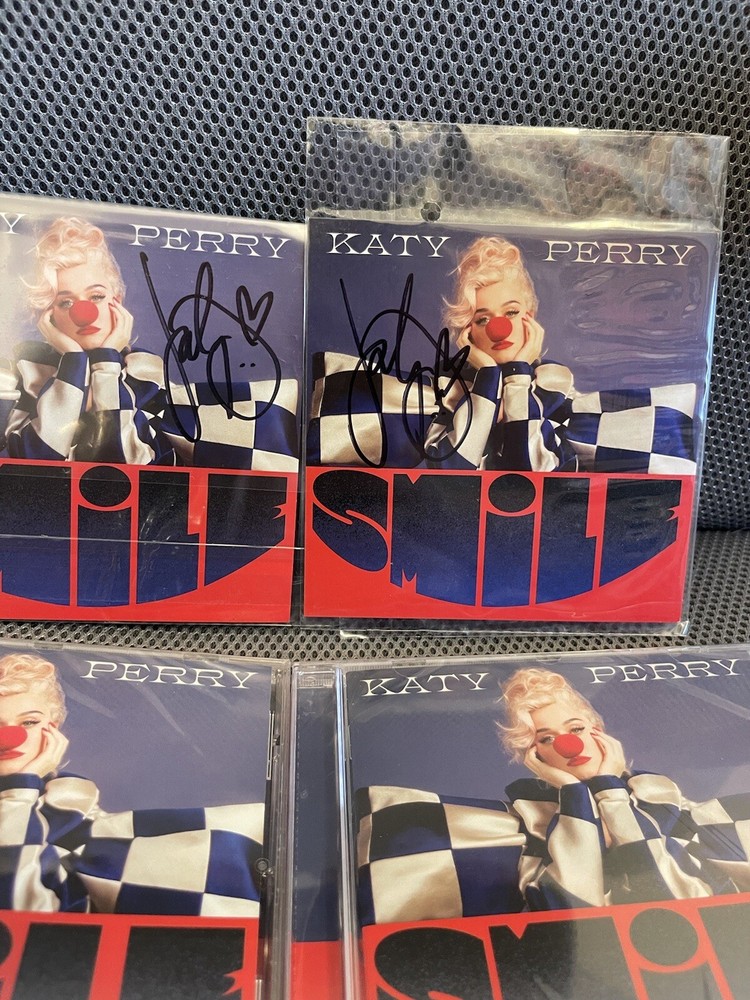 KATY PERRY SIGNED CD "SMILE"