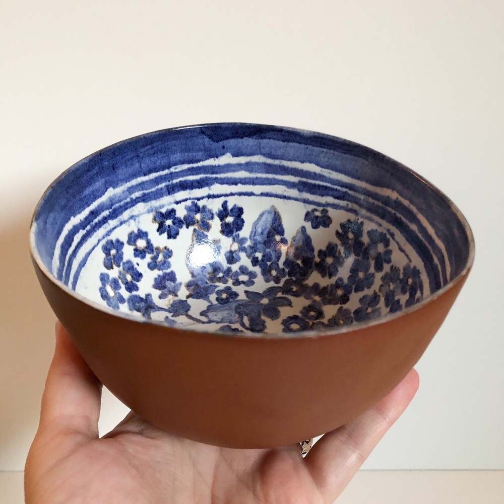 Signed Capuchin style bowl w/ glossy floral interior