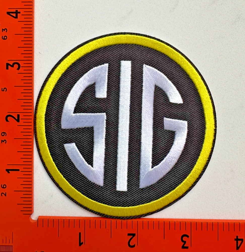 Sig Sauer Circle Embroidered Iron‑On Patch – Firearm Logo Emblem