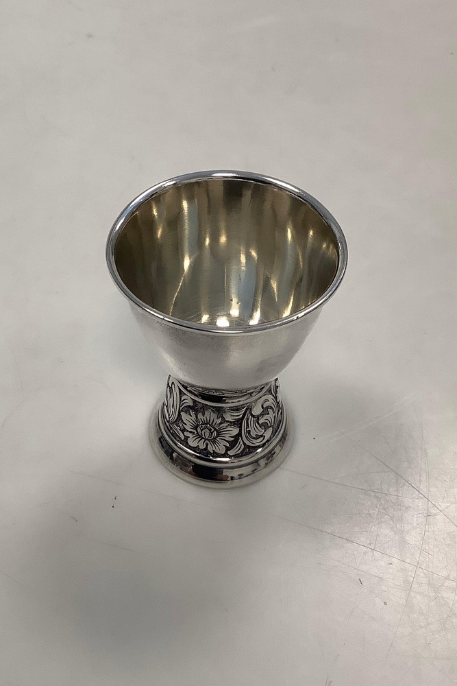 Egg cup in silver with ornamentation
