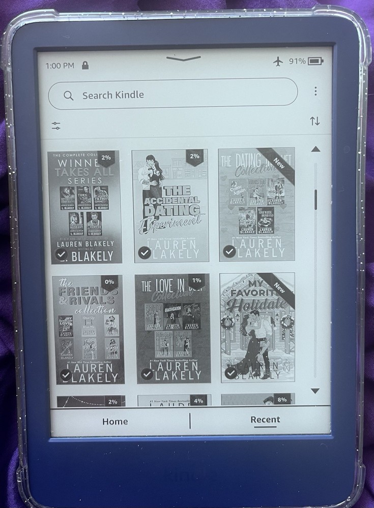 Amazon Kindle ereader Blue with books