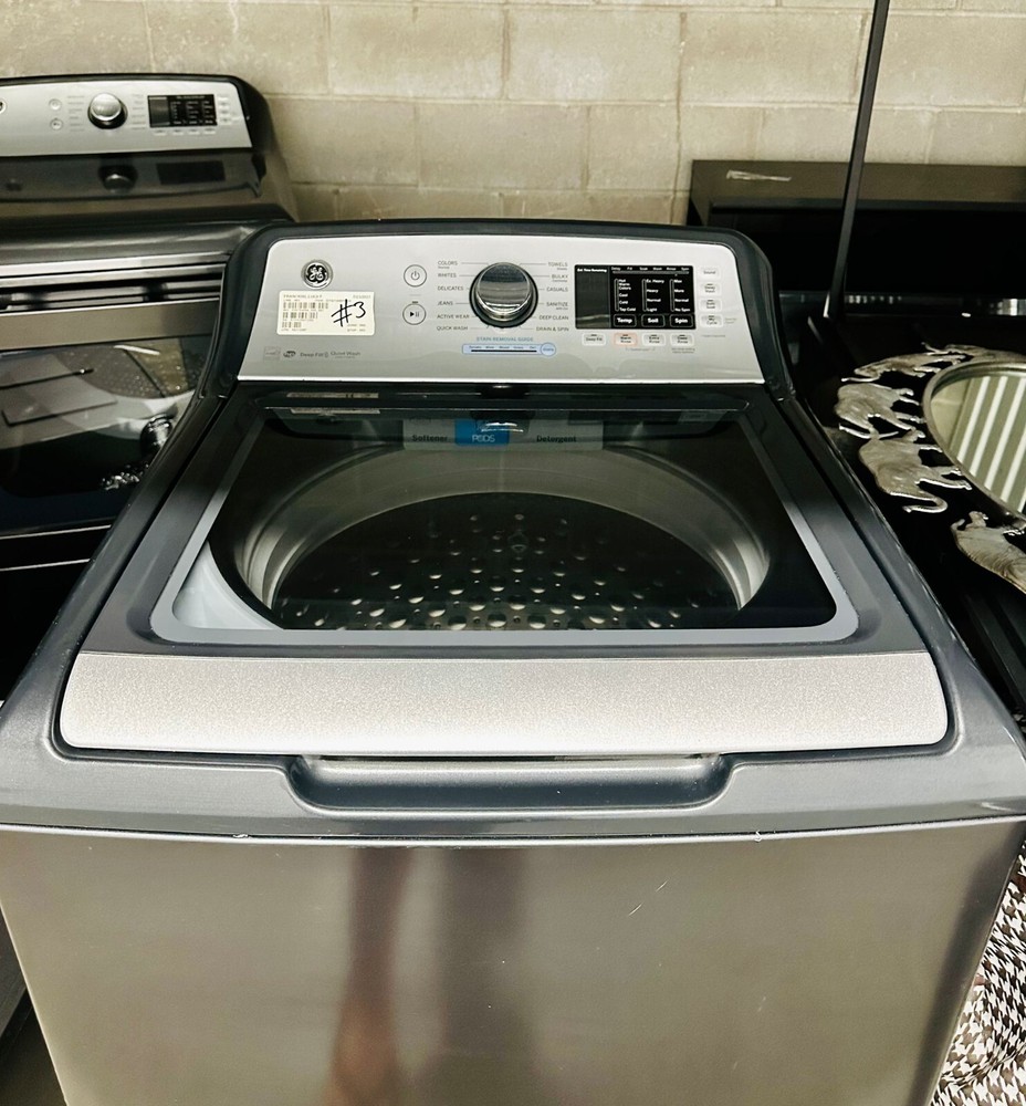 GE top load washer and dryer combination. Lightly used.