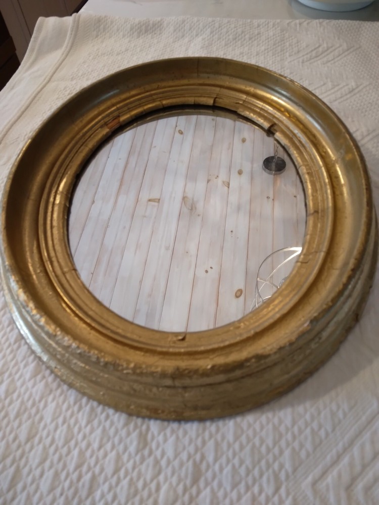 Antique Oval gilt Victorian mirror.