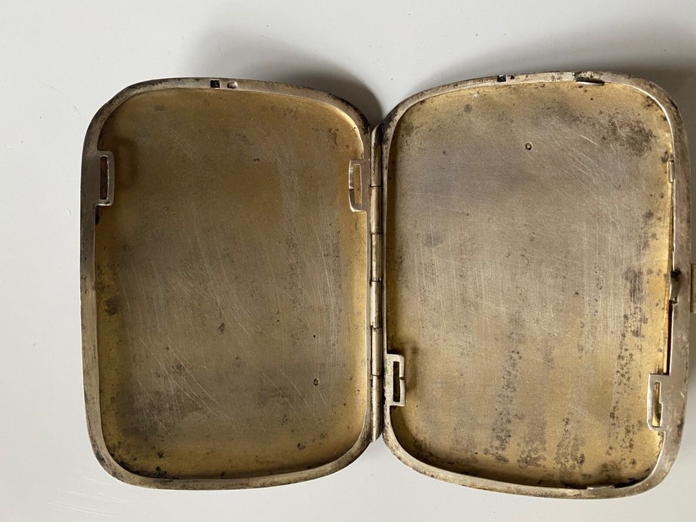 vintage silver cigarette case with gold inlay