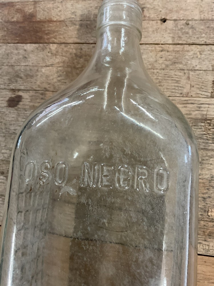 Antique OSO Negro glass bottle empty