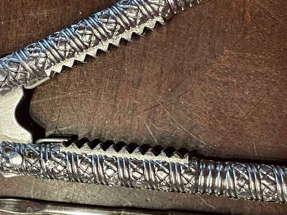 Vintage Handheld Metal Nutcracker w/ 4 picks