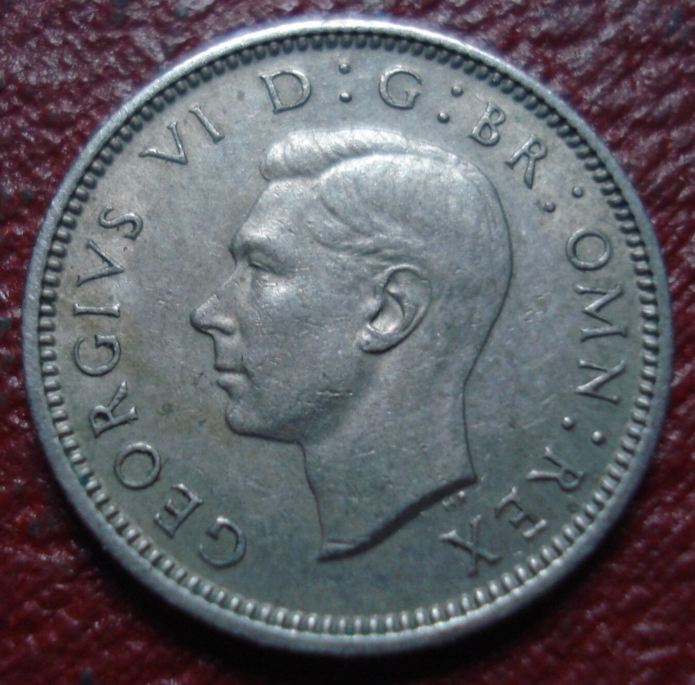 1950 BRITISH SIX PENCE IN VF-EF CONDITION