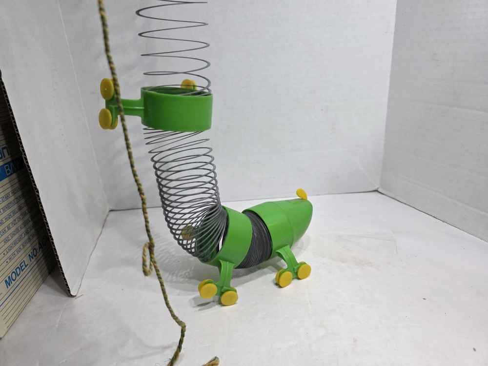 MR. WIGGLES CALA-PULLER SLINKY PULL TOY BOXED BY WILKENING SHARP