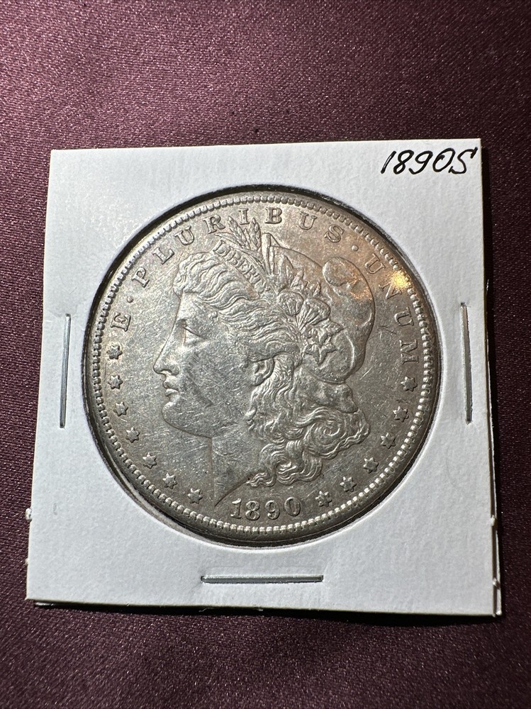 1890-S Morgan Silver Dollar grades AU