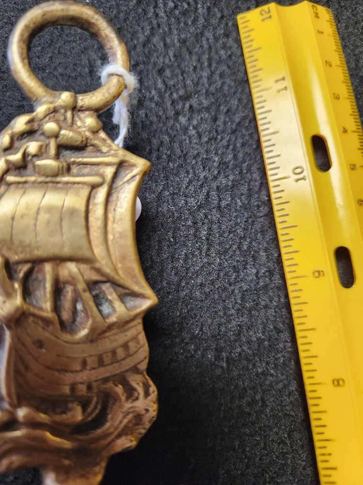 Victorian Brass Crumb Scraper With Ship Motif Handle.