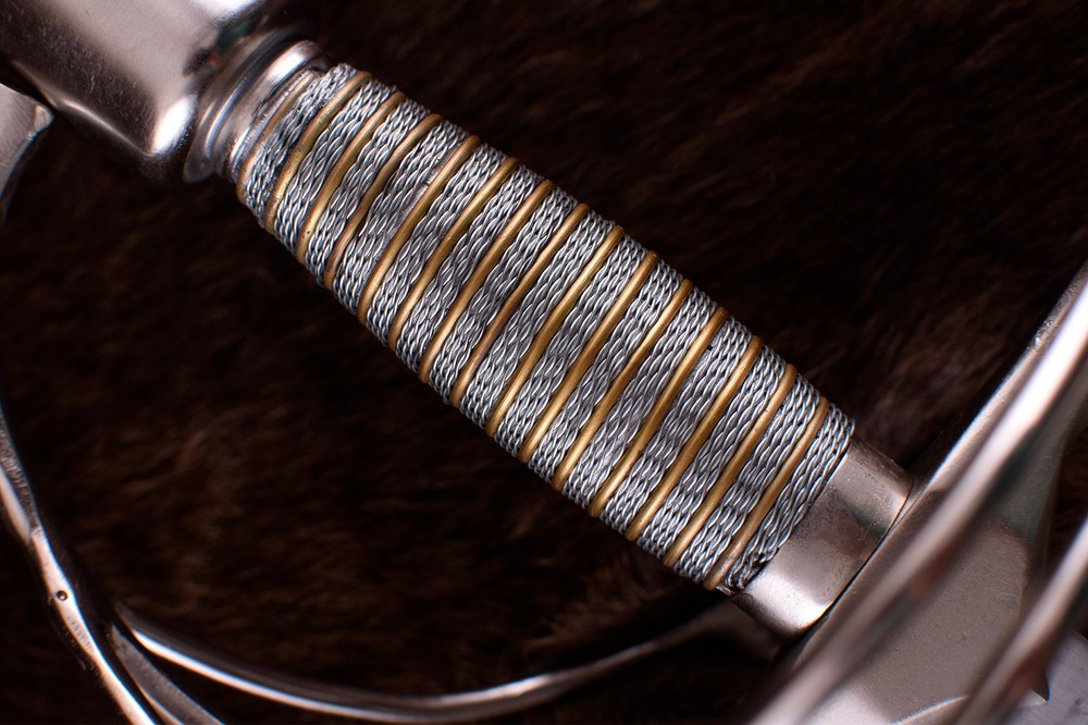 Thisque with German swept handle