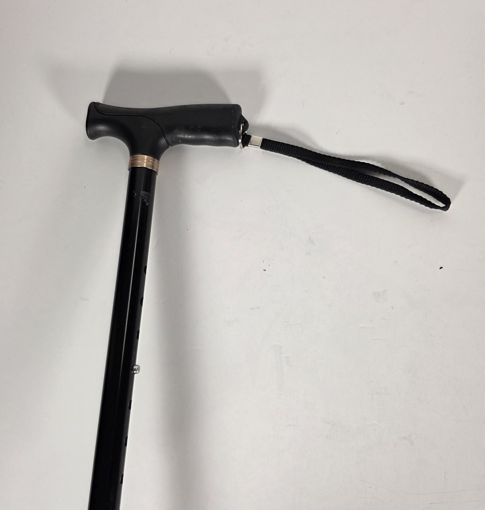Folding Cane 4 section three leg base comfortable grip black color light weight