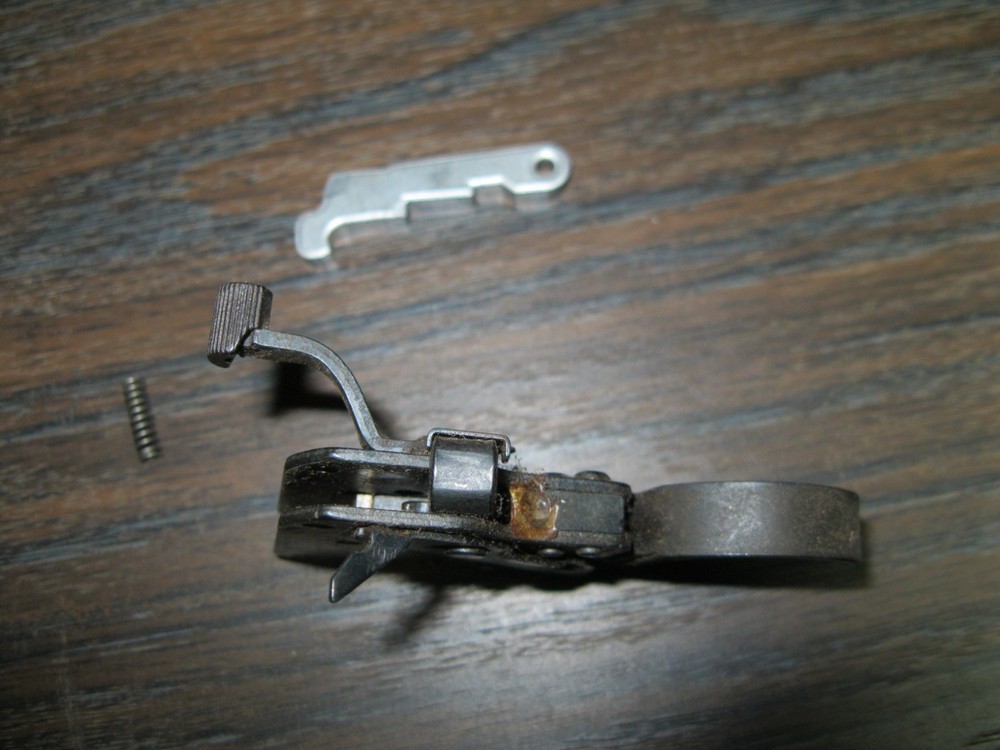 Used Remington 700 Trigger assembly with sear and spring