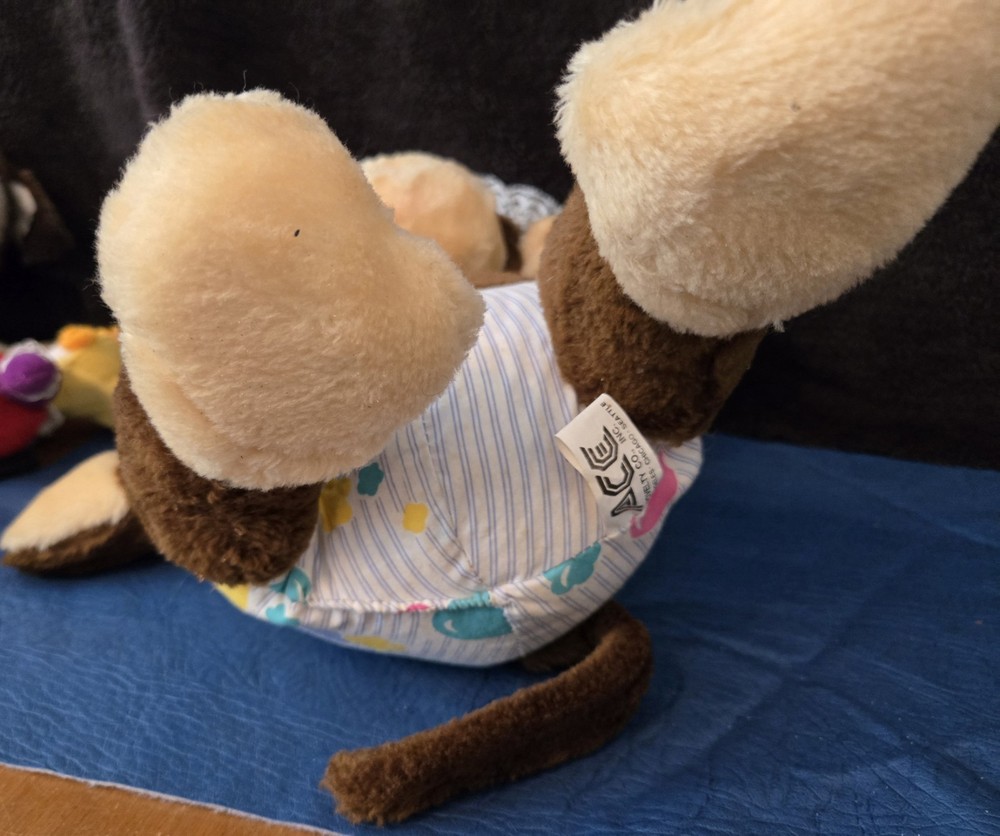 2 Plush Monkeys. Pacifier. ACE Amusement Park Novelty.