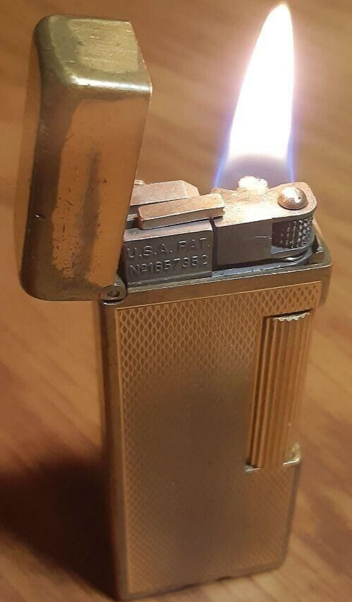 Working Dunhill oil lighter gold without box