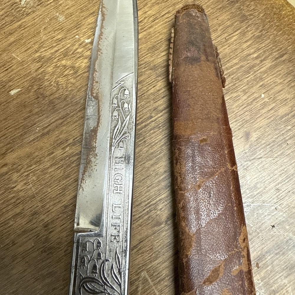 A GERMAN SOLINGEN DAGGER WITH ENGRAVED BLADE