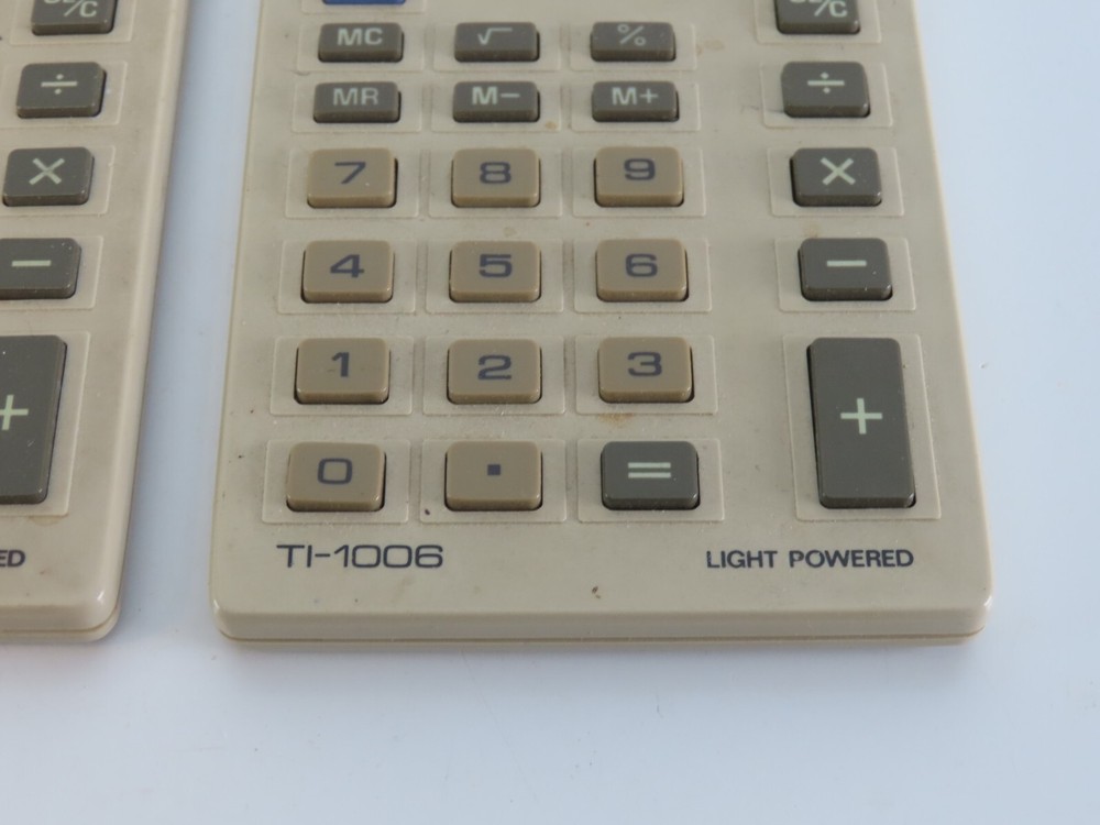 Lot of 2 Texas Instruments TI-1006 Light Powered Calculators Working