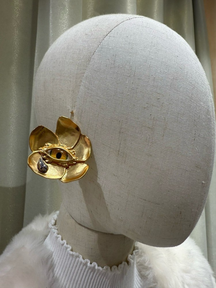 Schiaparelli flower yellow eye earring