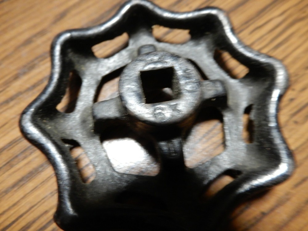 VINTAGE BLACK CAST IRON HANDLE APPROX 2 3/4" WIDE