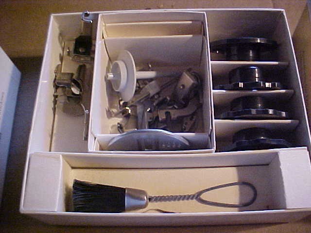 Singer sewing machine 620 4 boxes of attachments