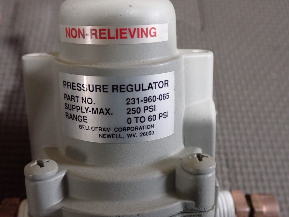 Gas flow regulators and desiccant