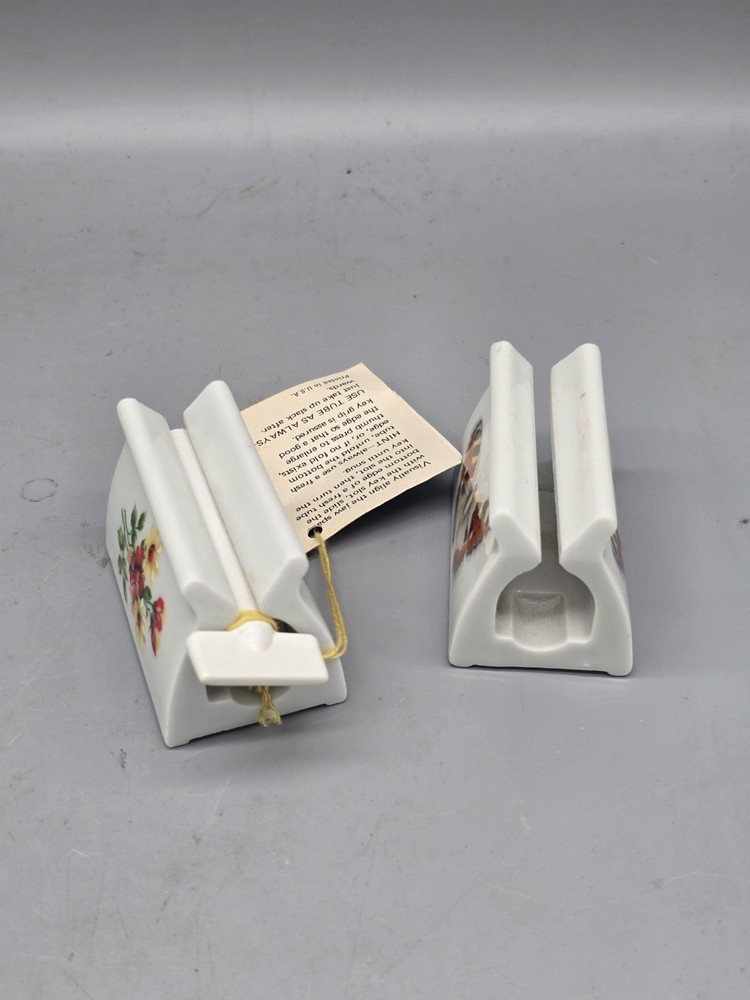 NOS Indispensable Dispenser Toothpaste Tube Roller Pair Flower Moth