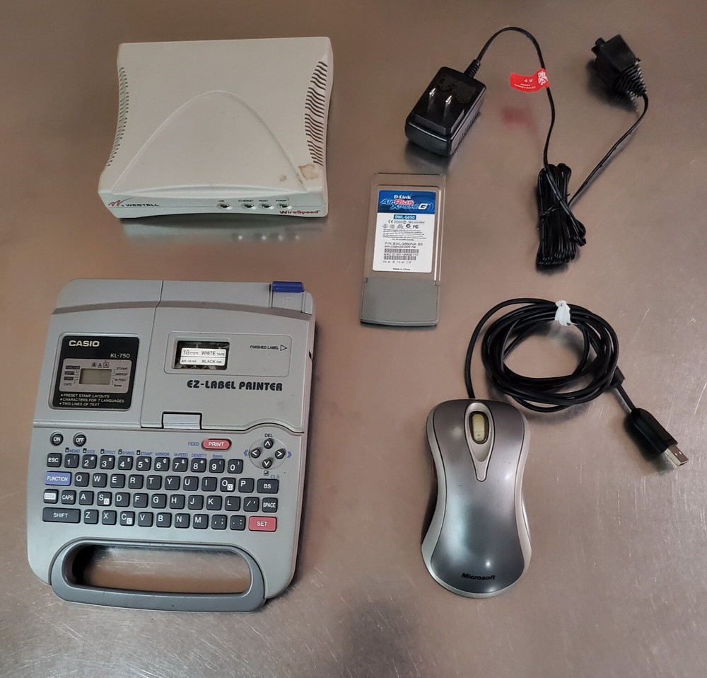 Lot of 5 Electronics Items: Casio, Microsoft, D-Link, Westell, Dirt Devil