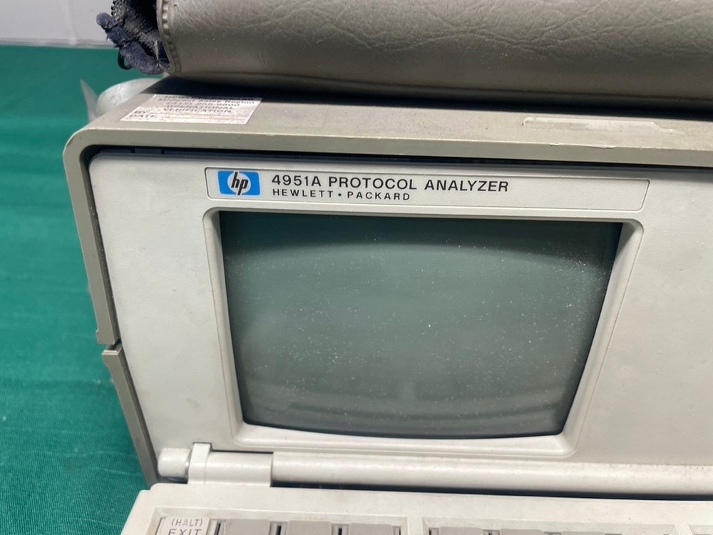 Hewlett Packard HP 4951A protocol analyzer with accessories 18180A interface