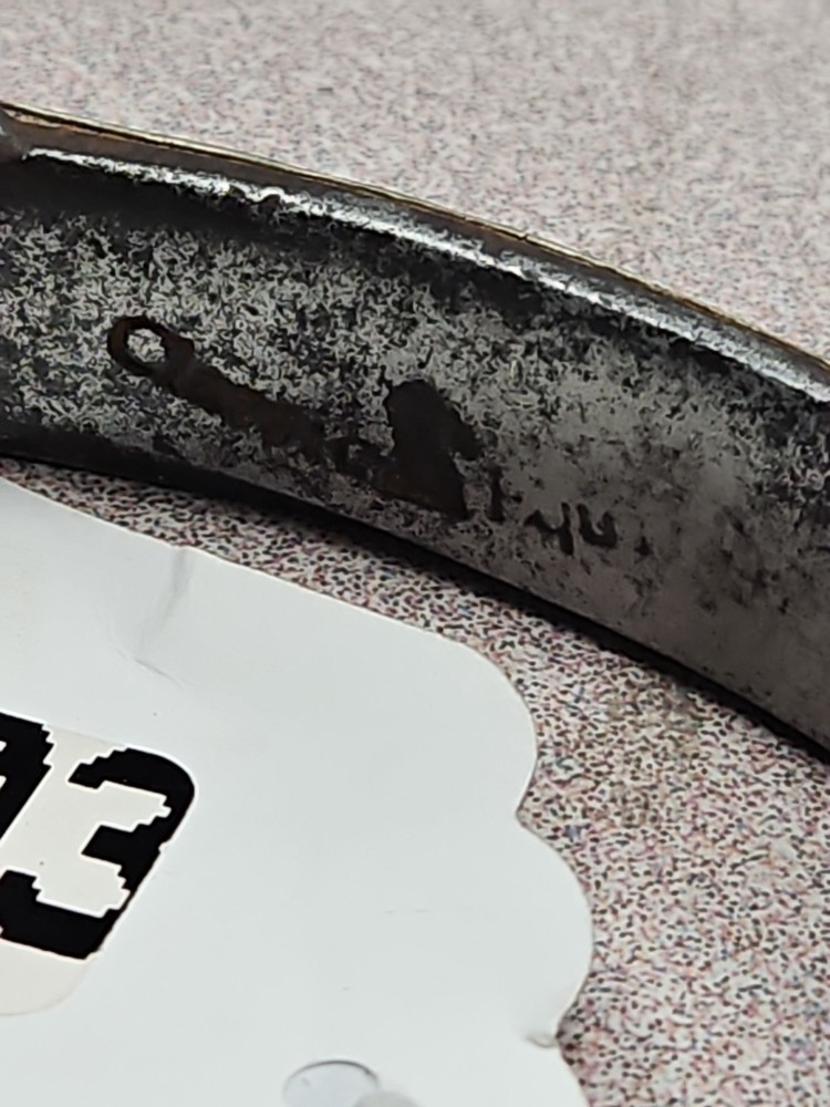 hand-forged spurs feature engraved silver inlay
